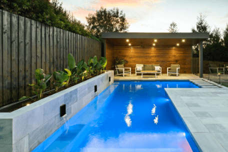 Stone backyard pool